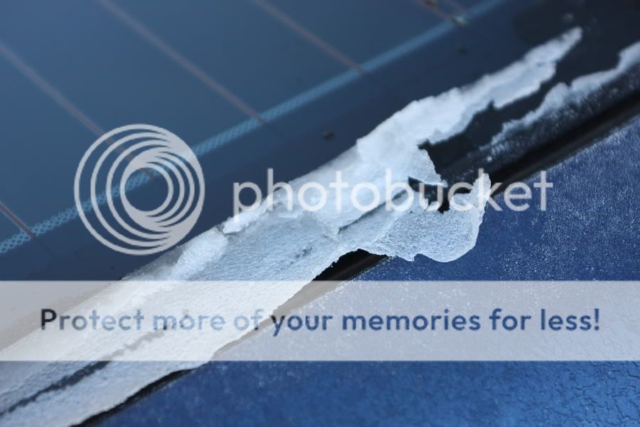 IMAGE: http://i380.photobucket.com/albums/oo250/smythiegato/Other/Defrostedrearglass.jpg